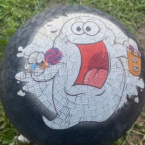 A kickball that has a ghost face on it